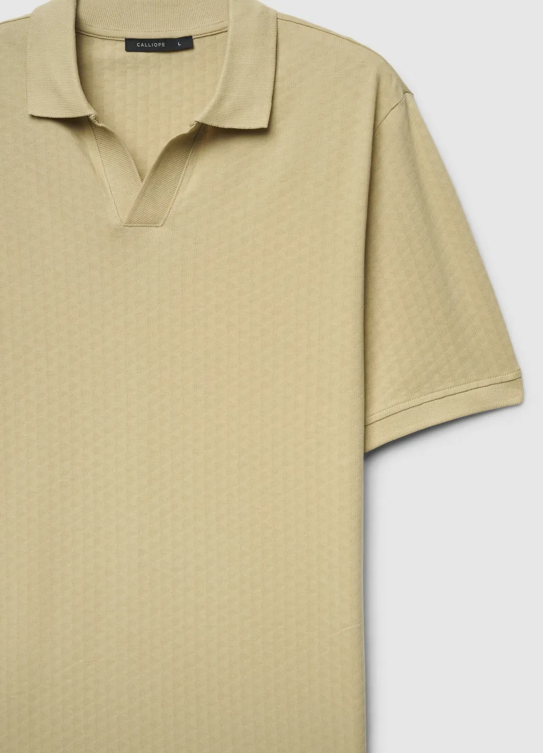 Calliope polo homme col ouvert jacquard uni