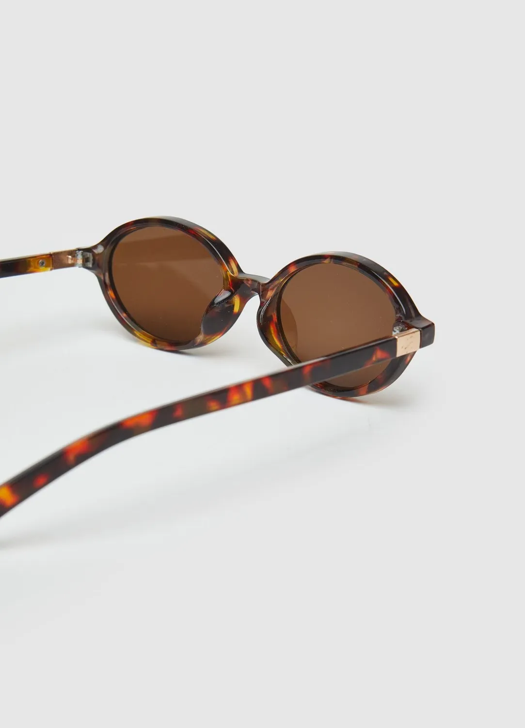 Calliope lunettes de soleil cat-eye écaille femme