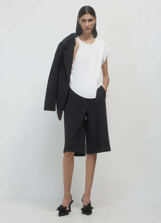 Calliope Pieghe blouse femme sans manches plissée