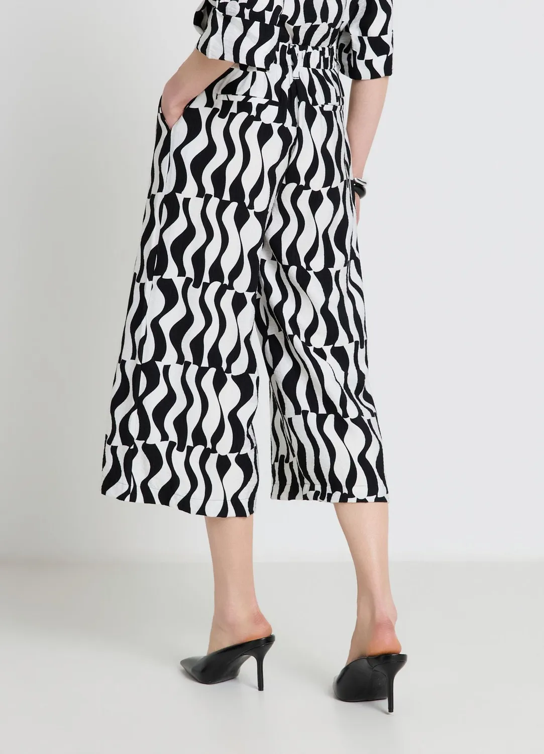 Calliope pantalon palazzo crop femme à motif