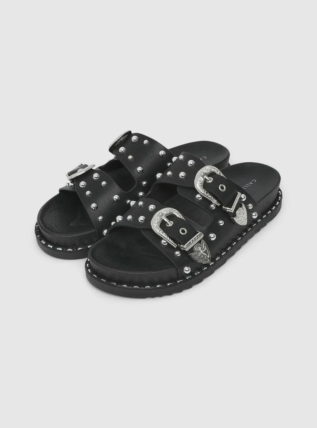 Calliope mules double boucle clous femme