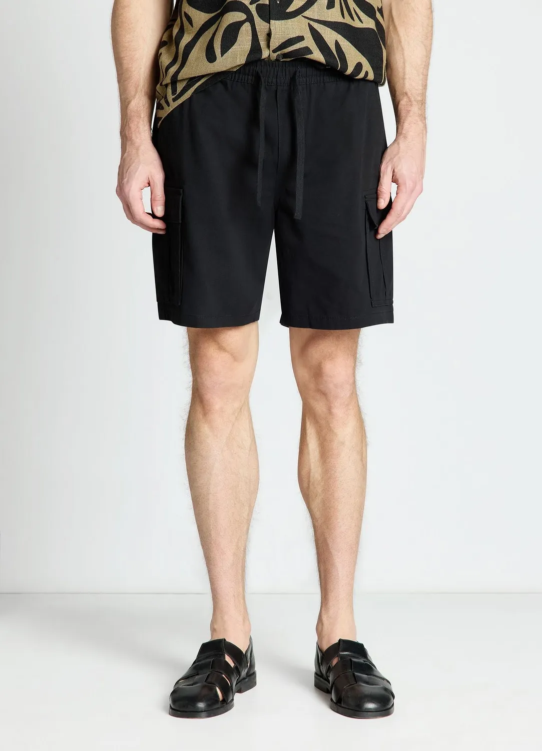Calliope short jogger cargo homme poches à rabat