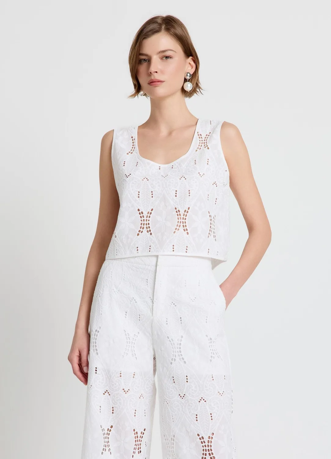 Calliope Top sangallo sans manches femme