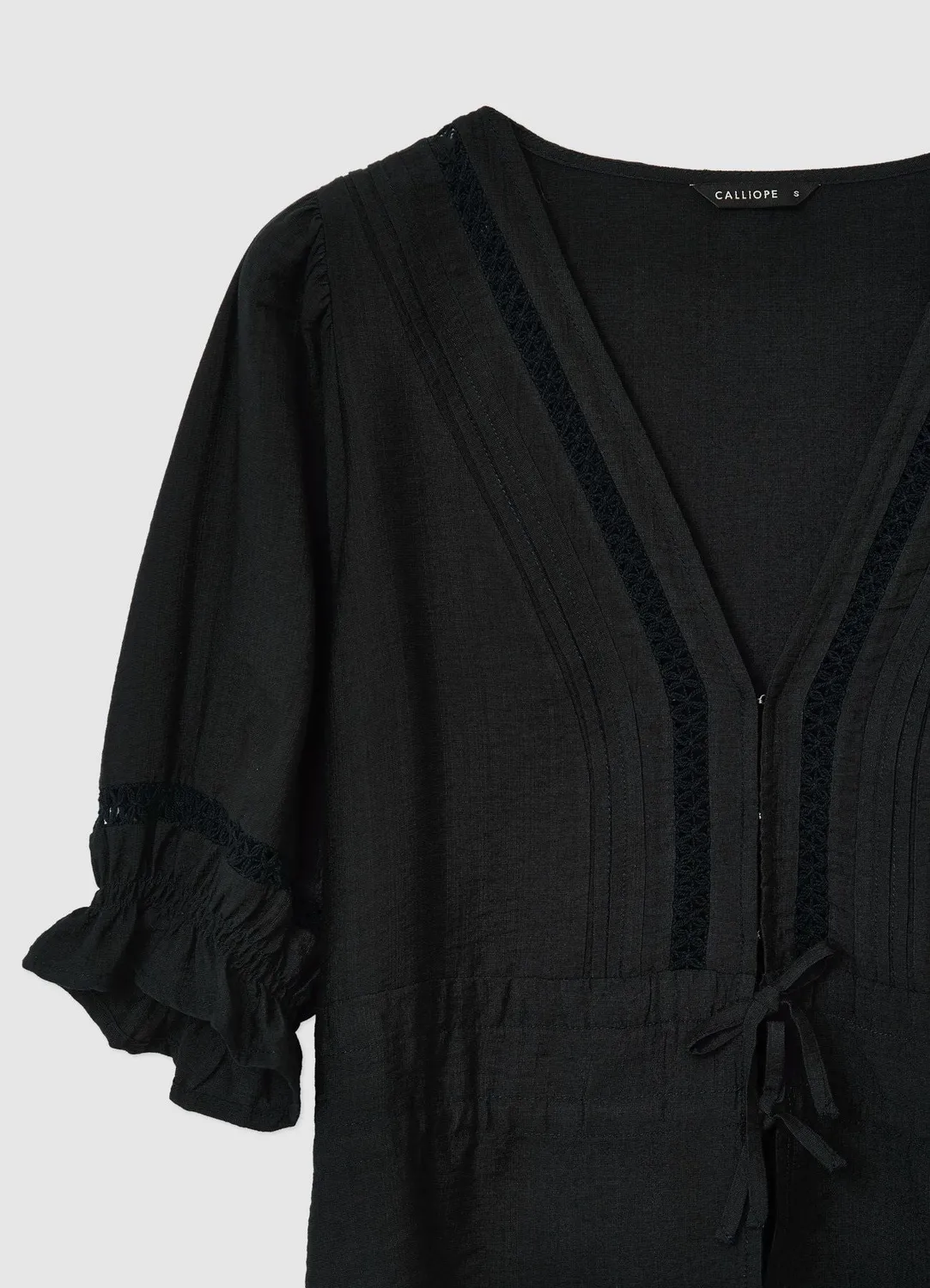 Calliope Blouse femme manches courtes col V broderie ajourée