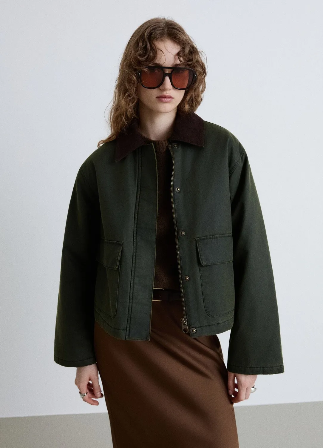 Calliope Veste cirée col contraste coupe courte femme
