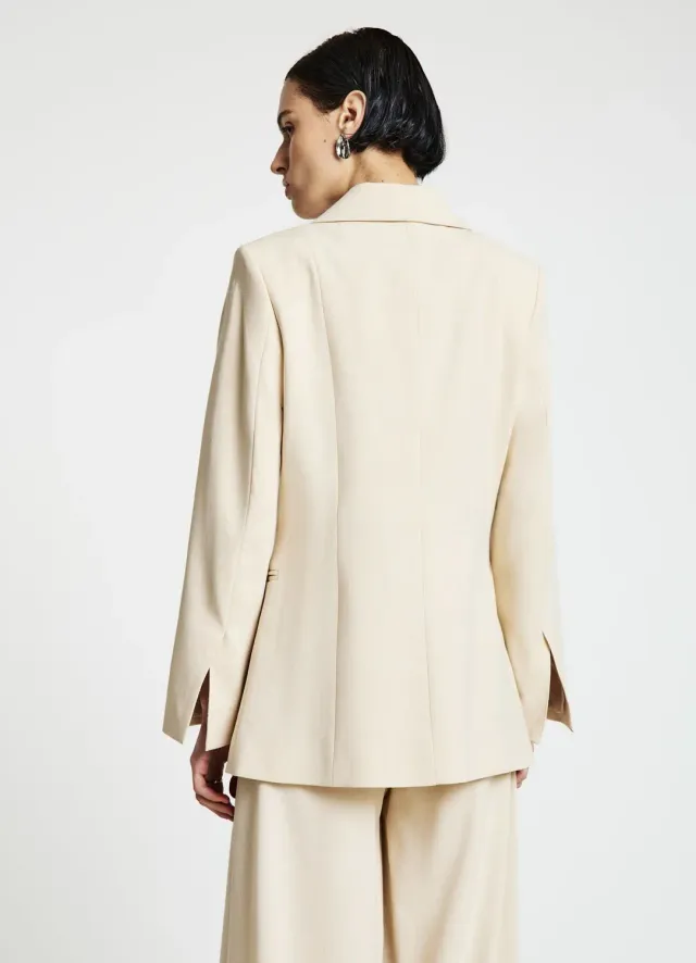 Calliope Giacca monopetto asimmetrica blazer femme bouton bijou