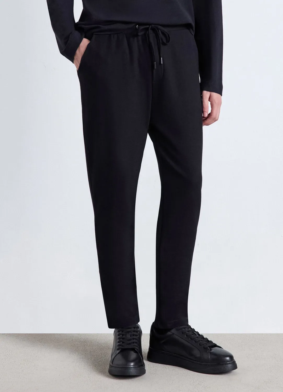 Calliope pantalon jogging homme uni à cordon