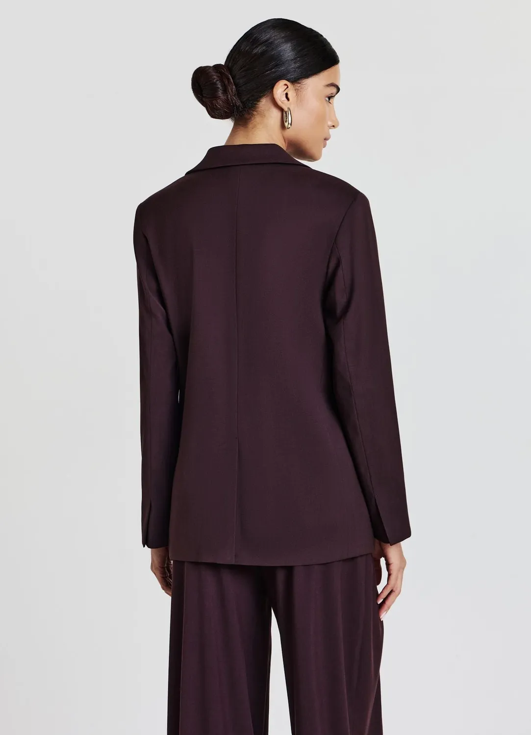 Calliope veste femme tailleur à boucle unie