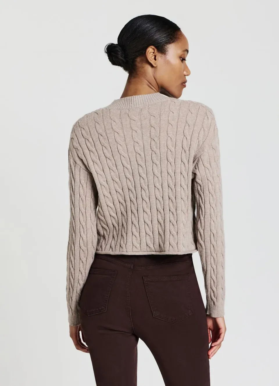 Calliope pull crop torsadé manches longues femme