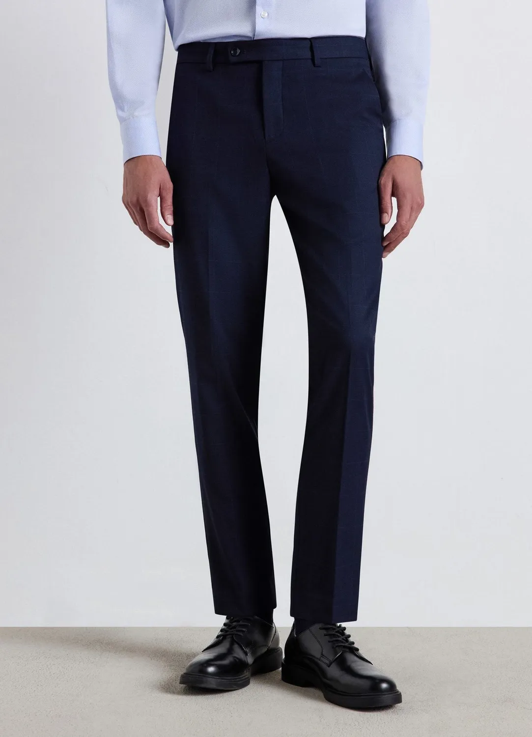 Calliope Atelier pantalon homme à carreaux droit