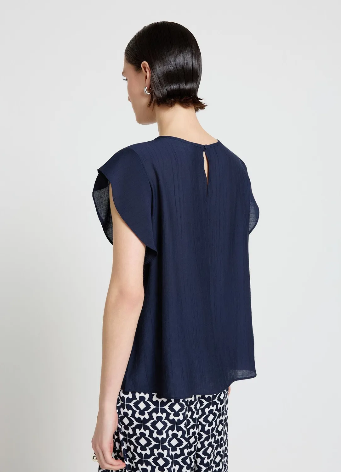 Calliope blouse unie manches volants col rond