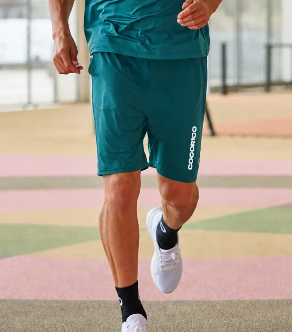 Cocorico Impact short sport homme vert léger