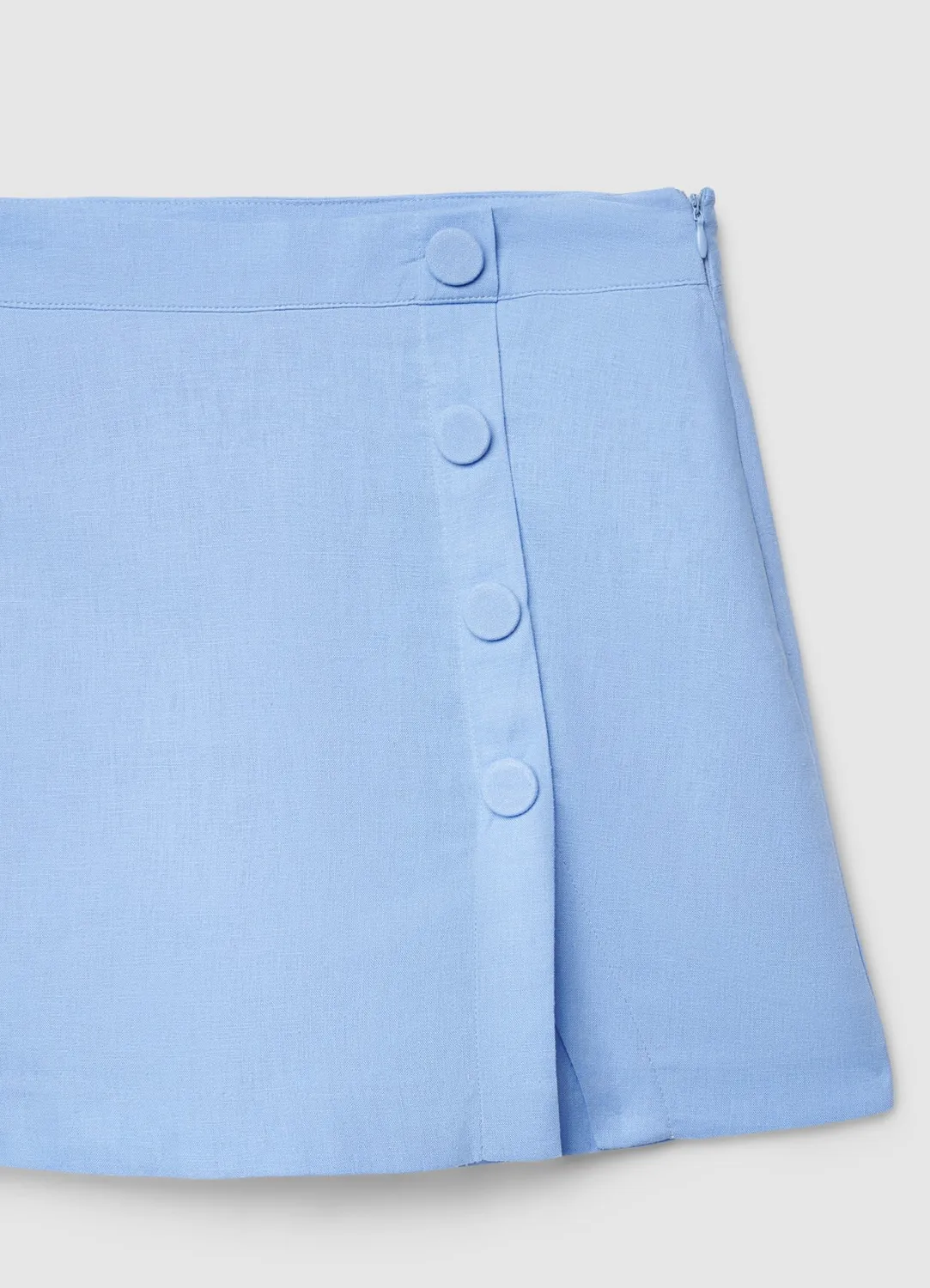 Calliope jupe-short boutons latéraux femme unie