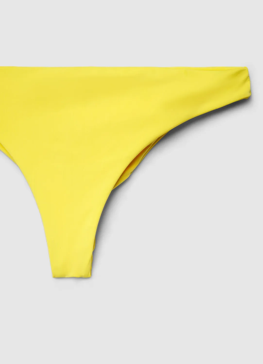 Calliope slip bikini brésilien froncé uni