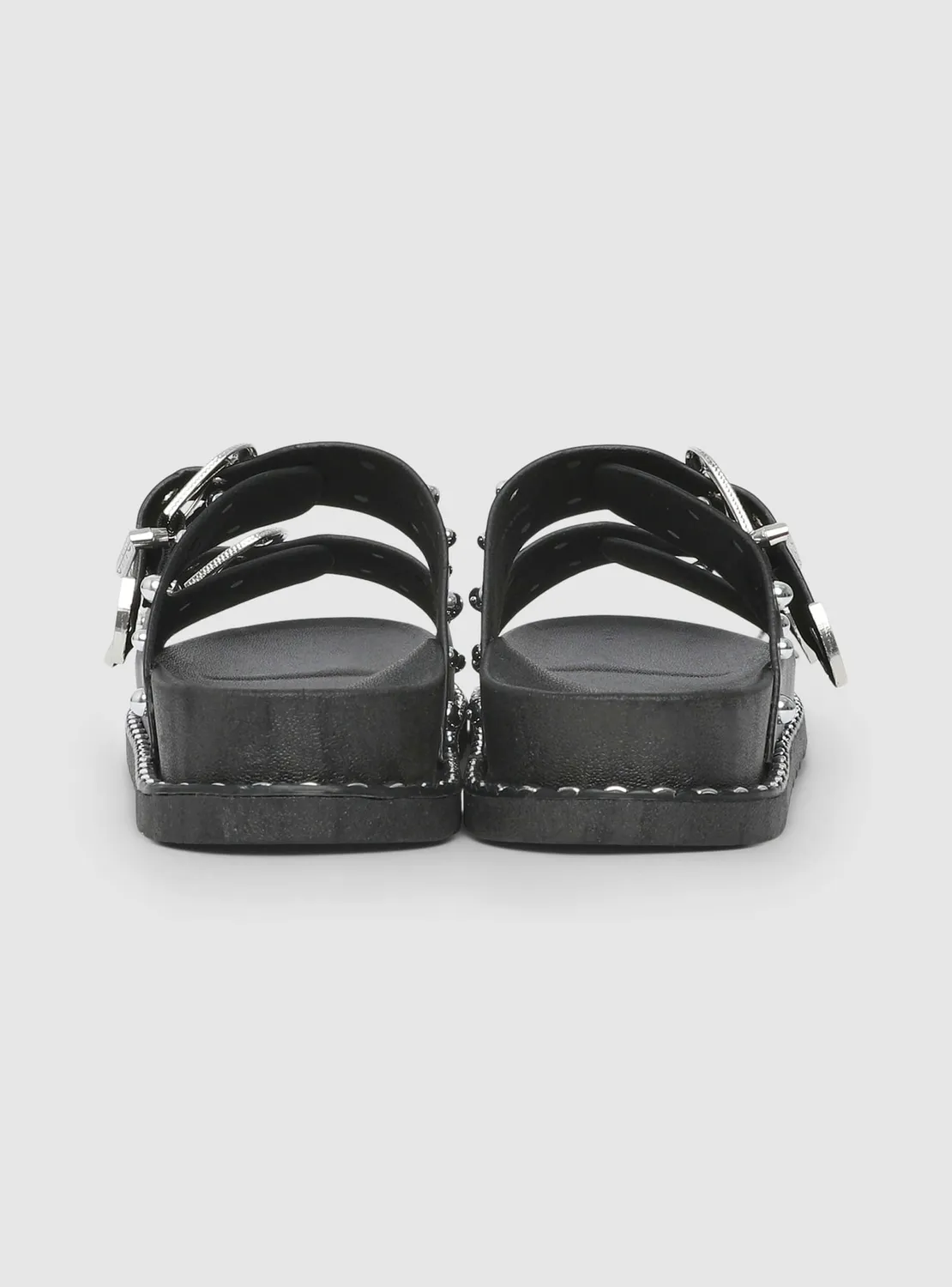 Calliope mules double boucle clous femme