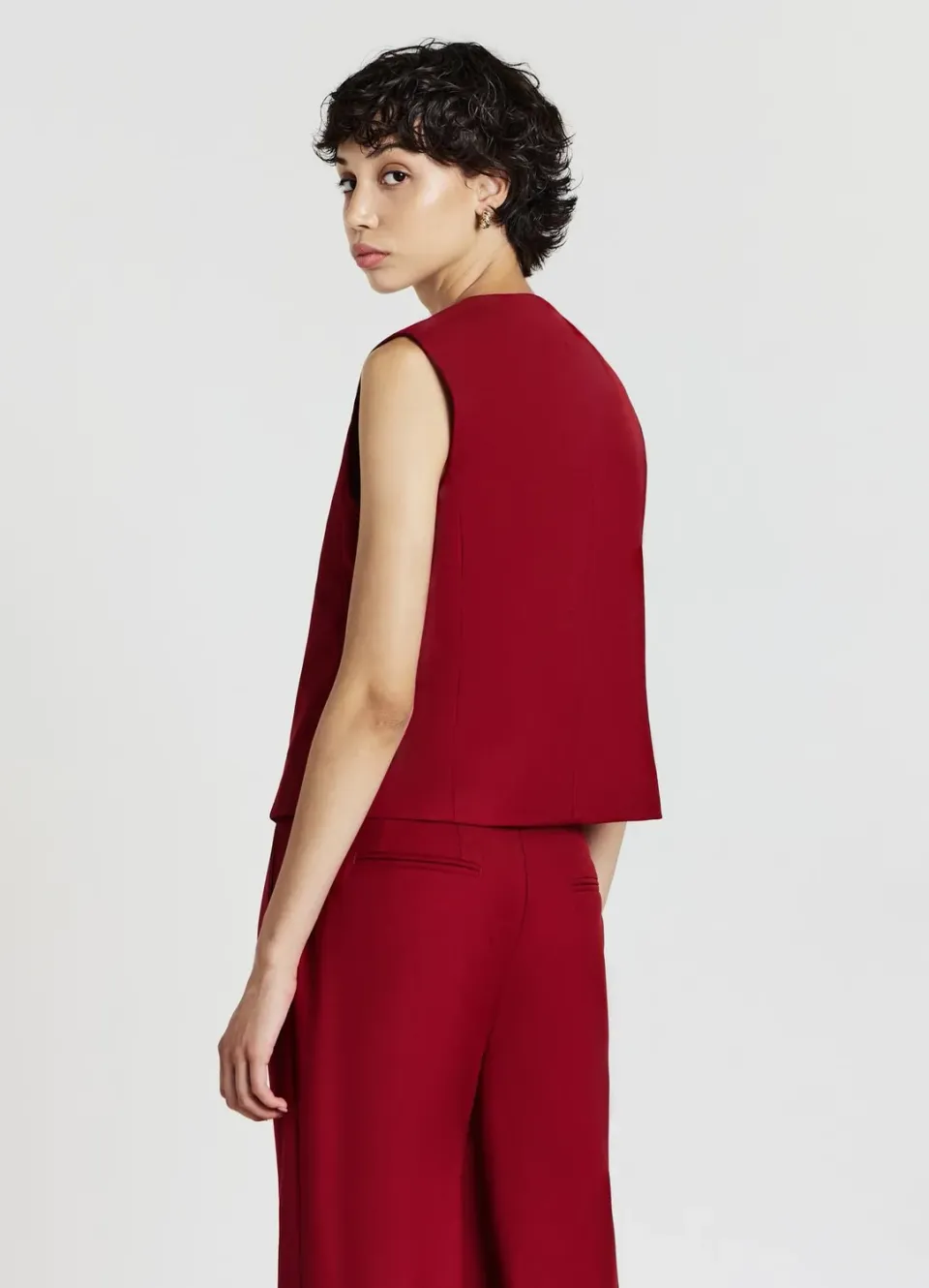 Calliope gilet asymétrique à boutons femme col rond