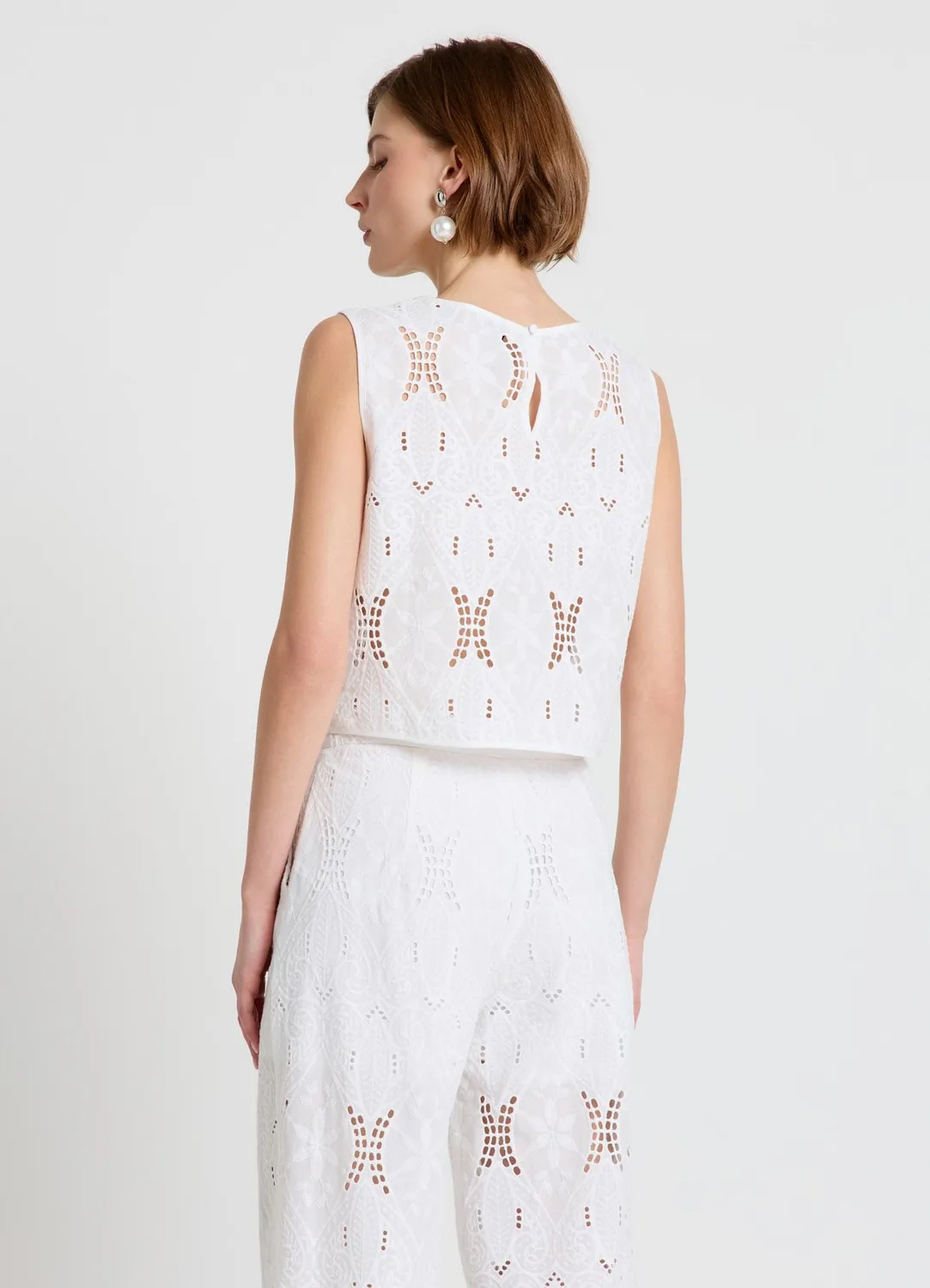 Calliope Top sangallo sans manches femme