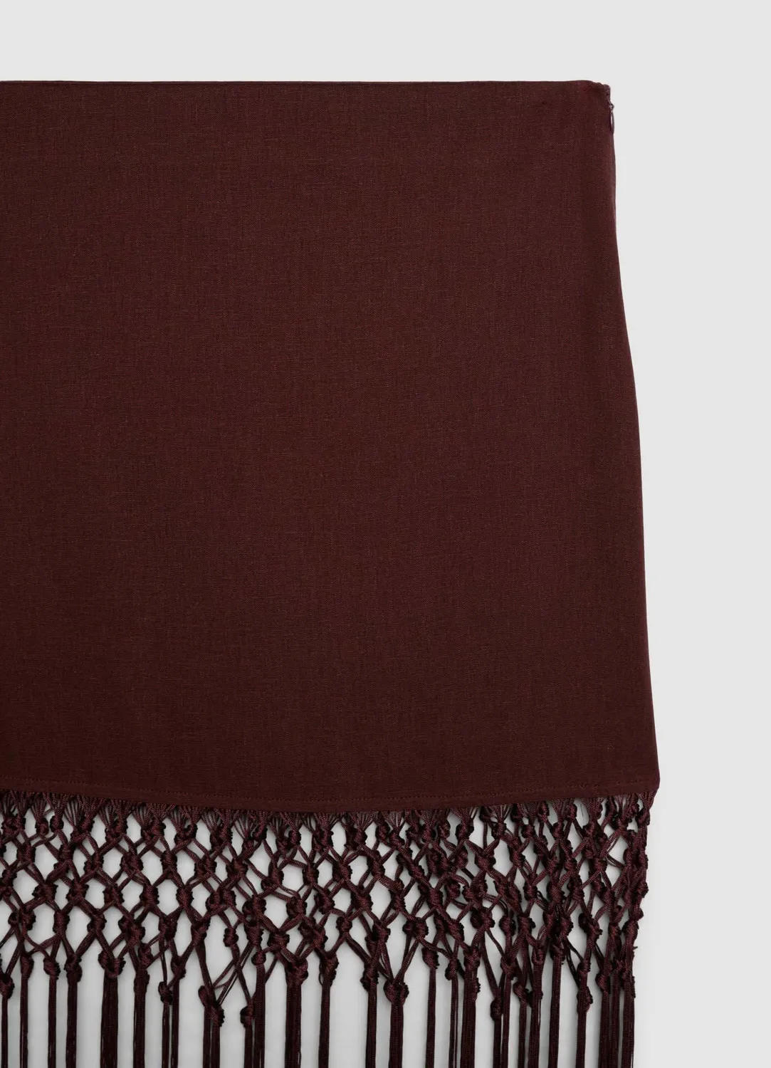 Calliope jupe mini unie à franges taille haute