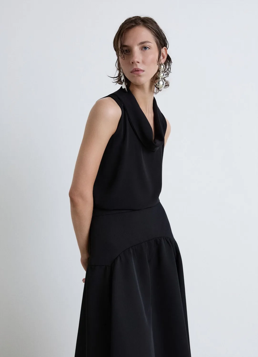Calliope top femme col drapé sans manches uni