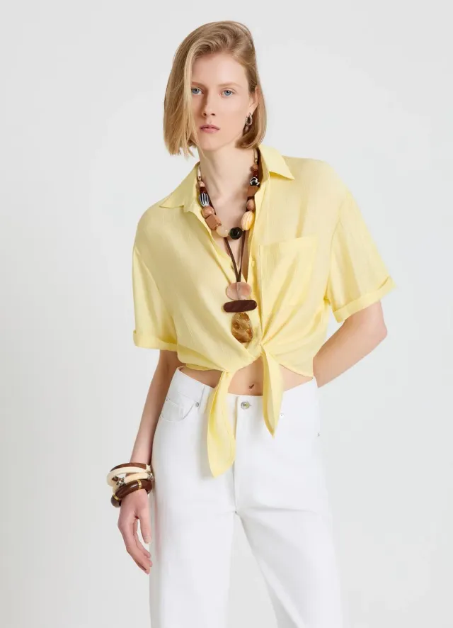 Calliope Chemise femme nouée unie manches courtes