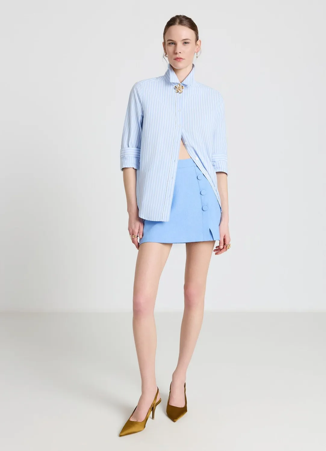 Calliope jupe-short boutons latéraux femme unie