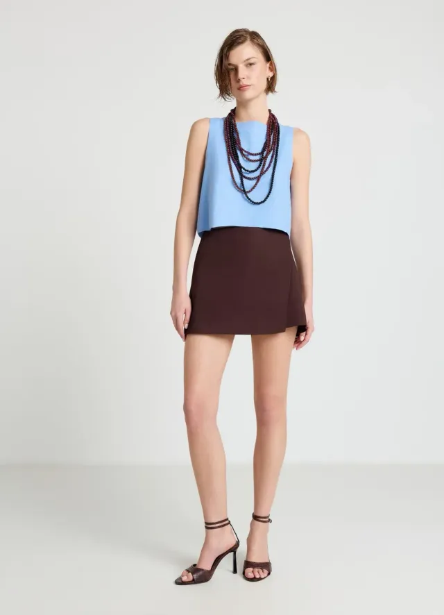 Calliope top court femme boutons dos