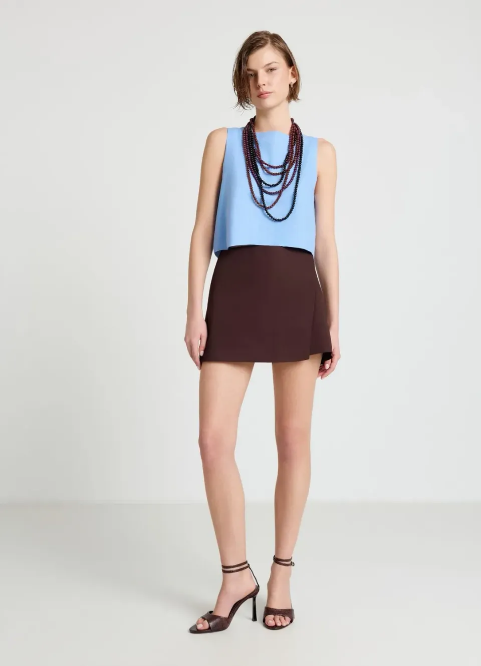Calliope top court femme boutons dos