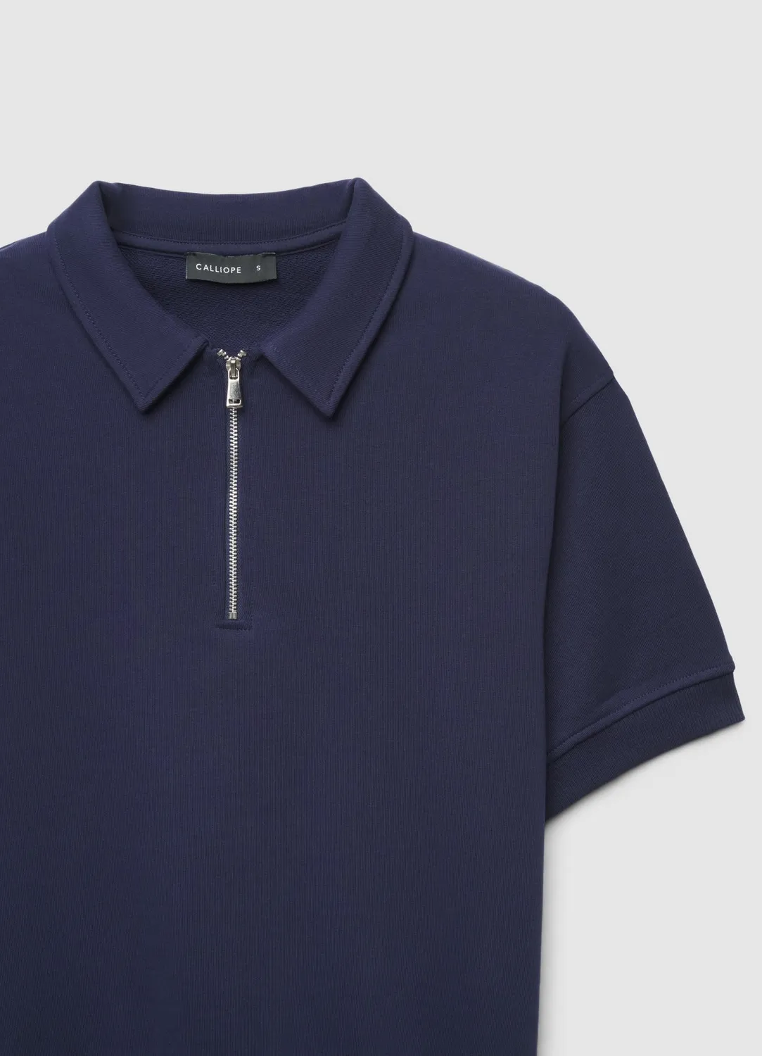 Calliope polo zip femme manches courtes uni