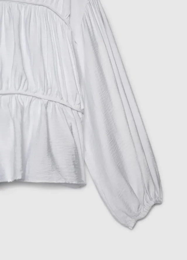Calliope blouse femme manches bouffantes unie