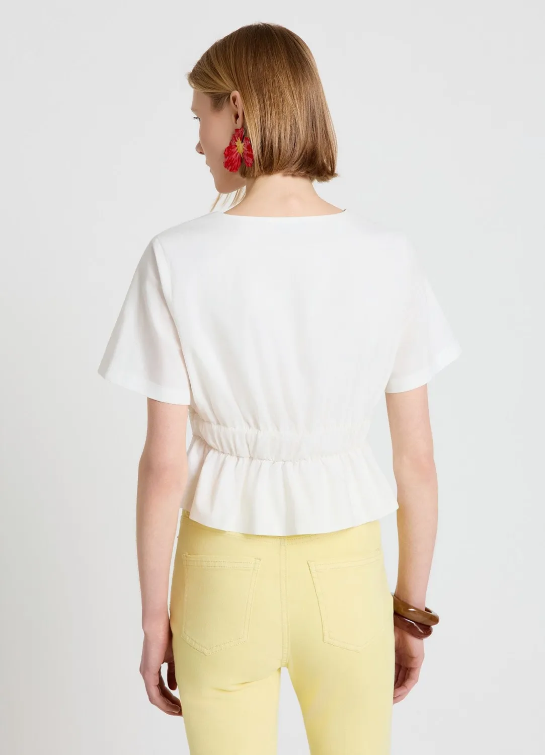Calliope top peplum col V femme taille resserrée