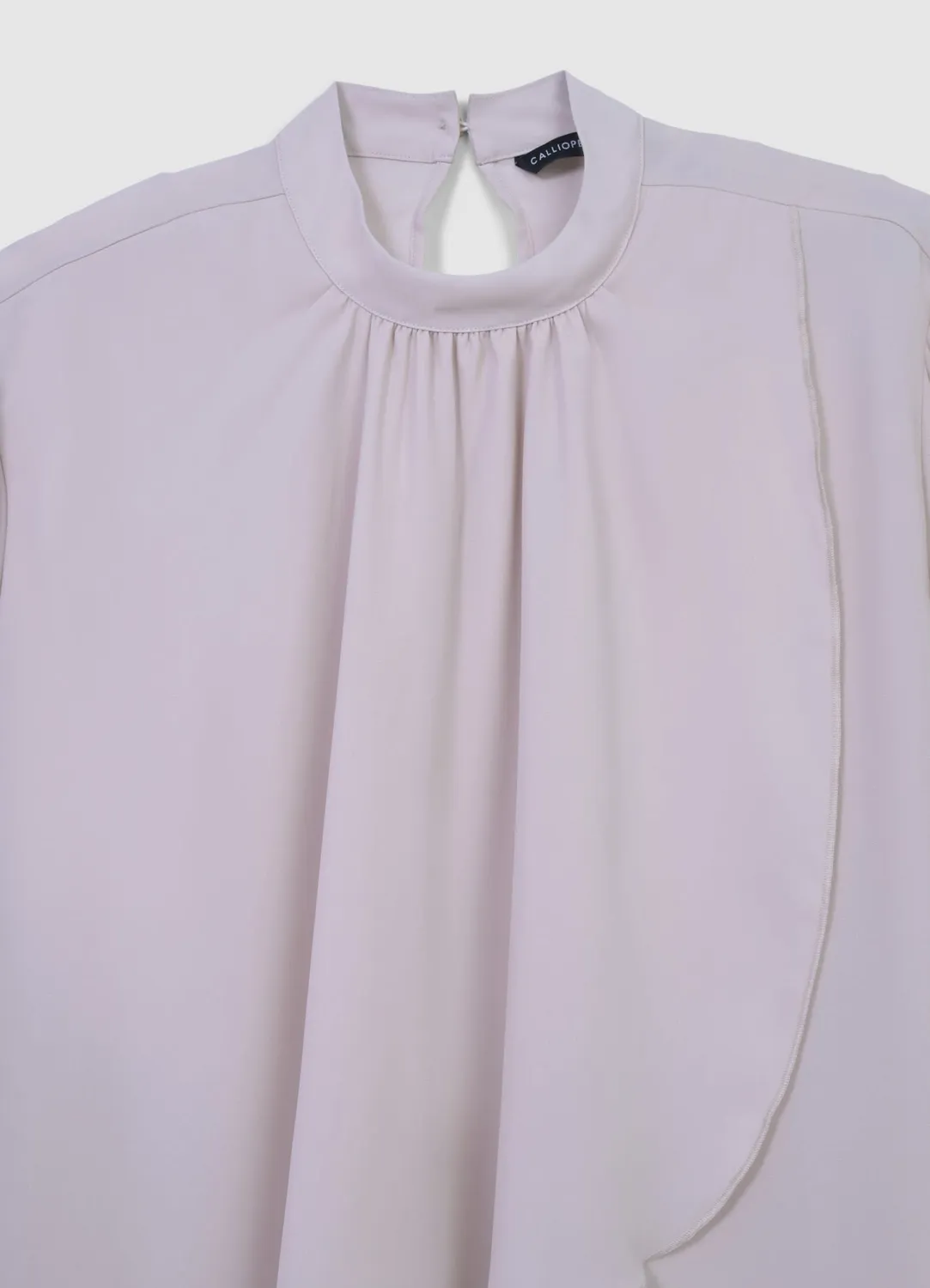 Calliope blouse à volants manches longues unie