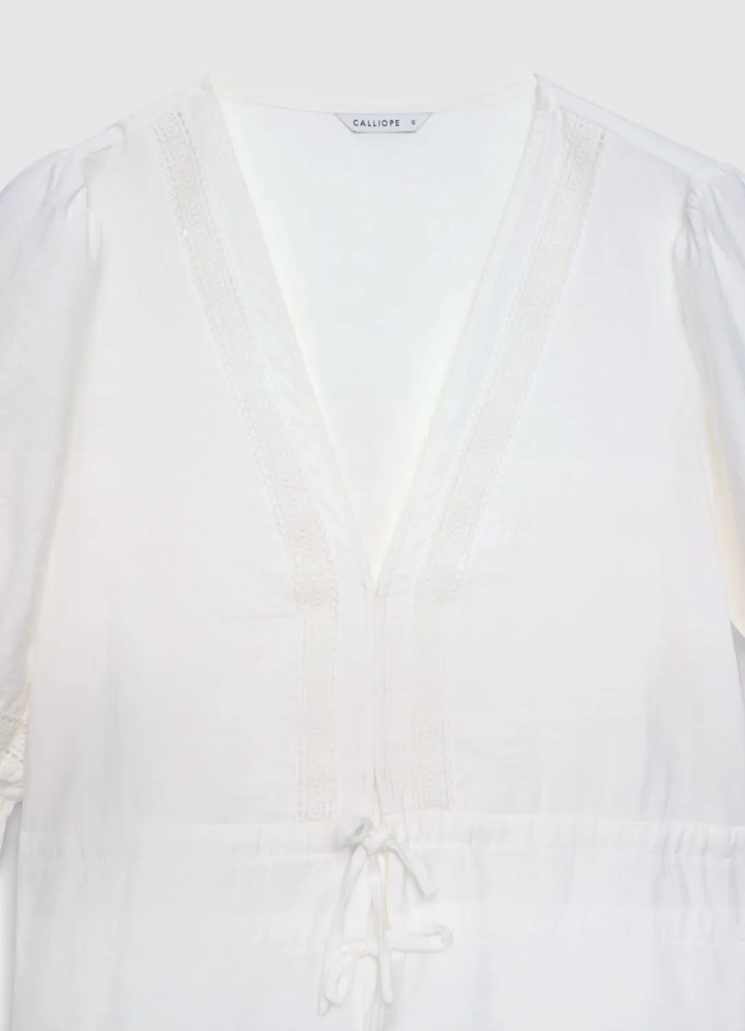Calliope blouse ajourée col V laçage femme