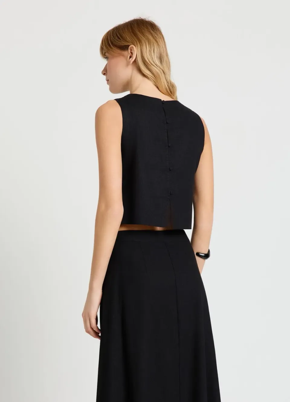 Calliope top court uni femme boutons dos