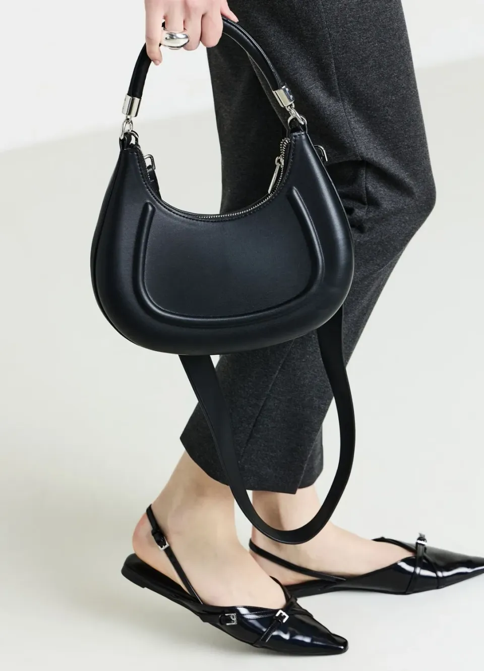 Calliope mezzaluna sac femme demi-lune rigide