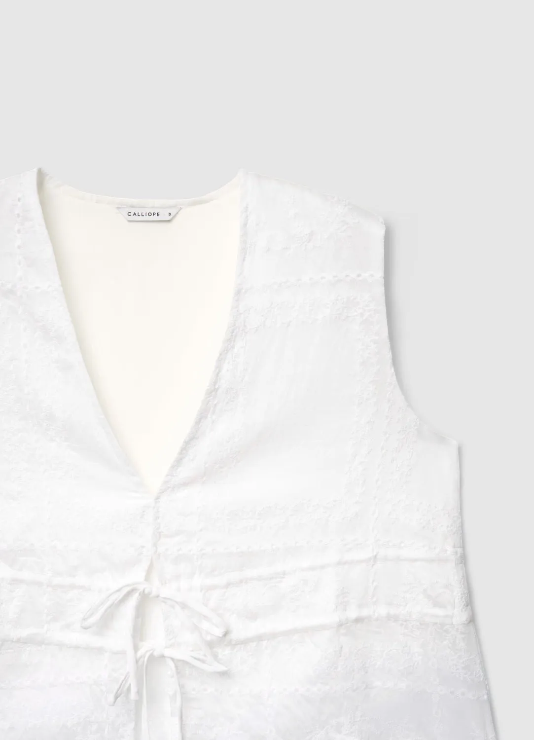 Calliope blouse sangallo femme lacets col V