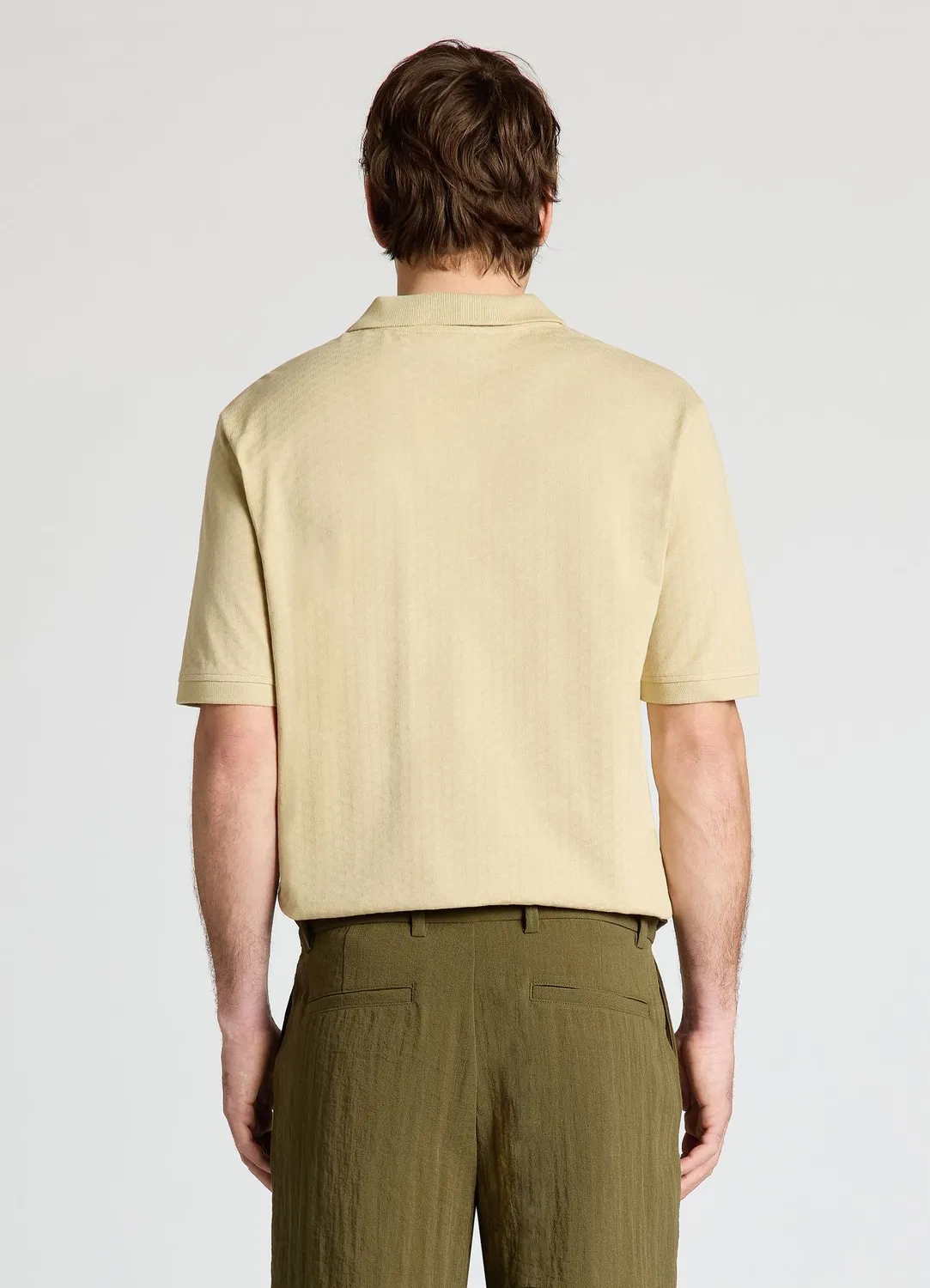 Calliope polo homme col ouvert jacquard uni