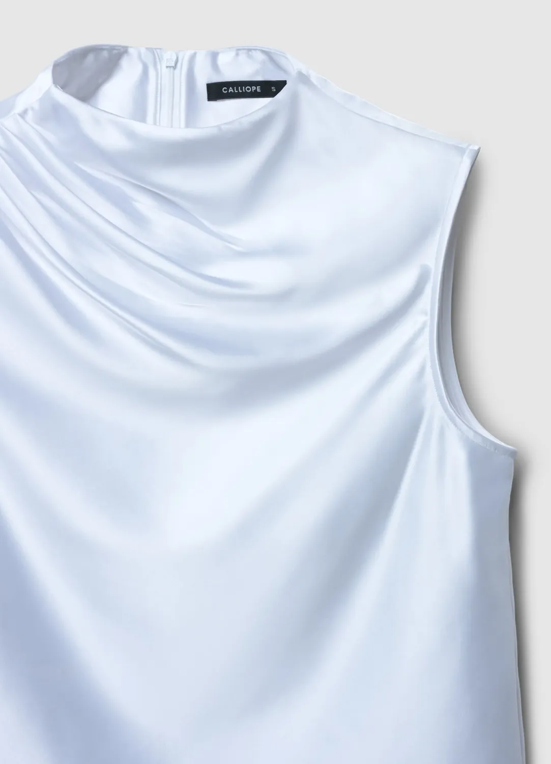 Calliope top satiné col rond sans manches femme