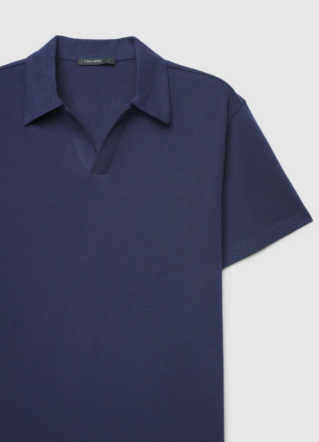 Calliope polo uni t-shirt homme col polo sans boutons