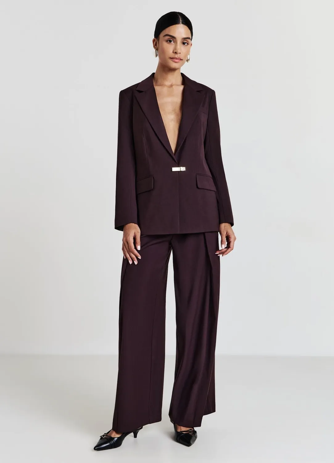 Calliope veste femme tailleur à boucle unie