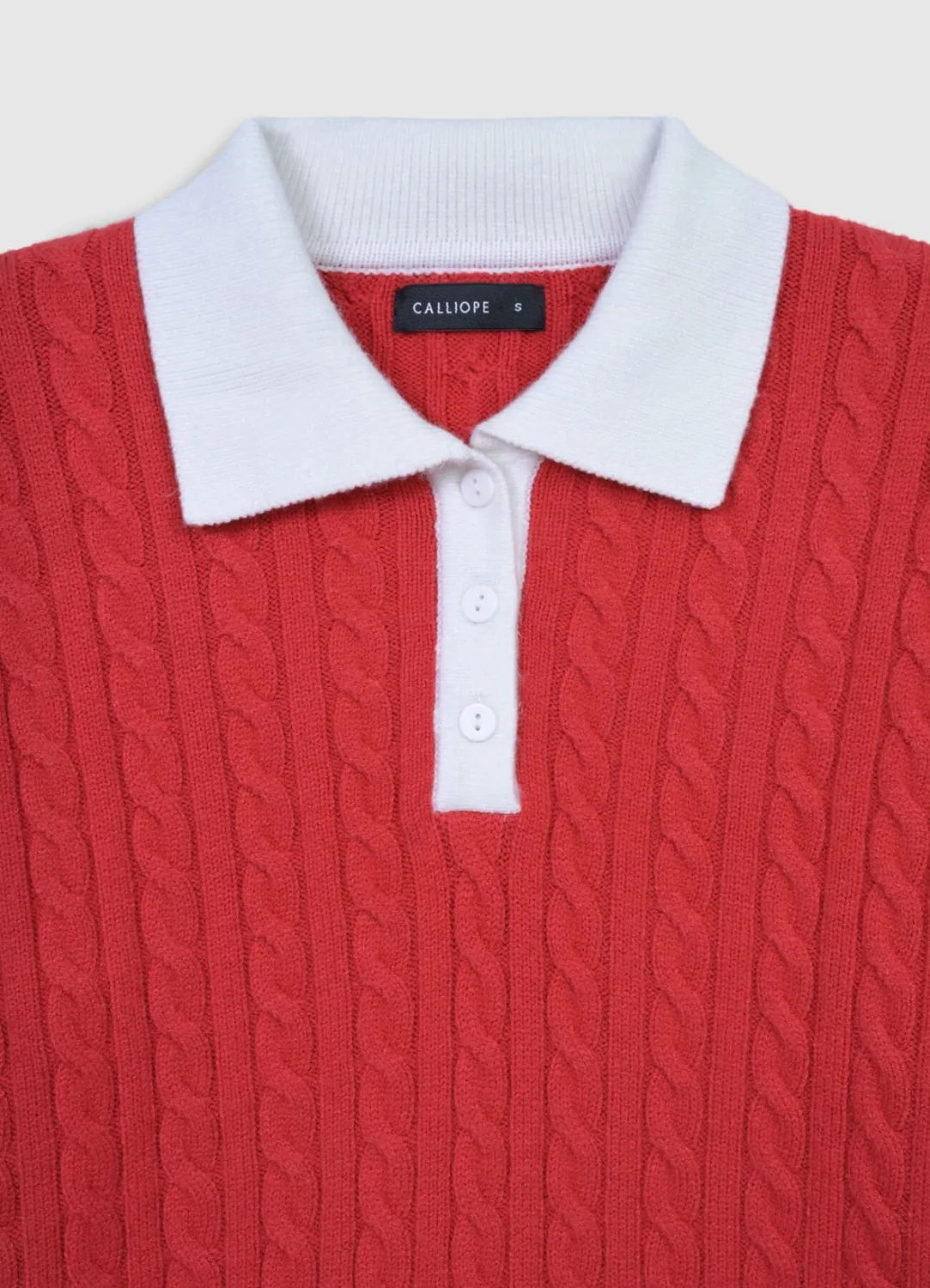 Calliope pull polo femme torsades bicolore court