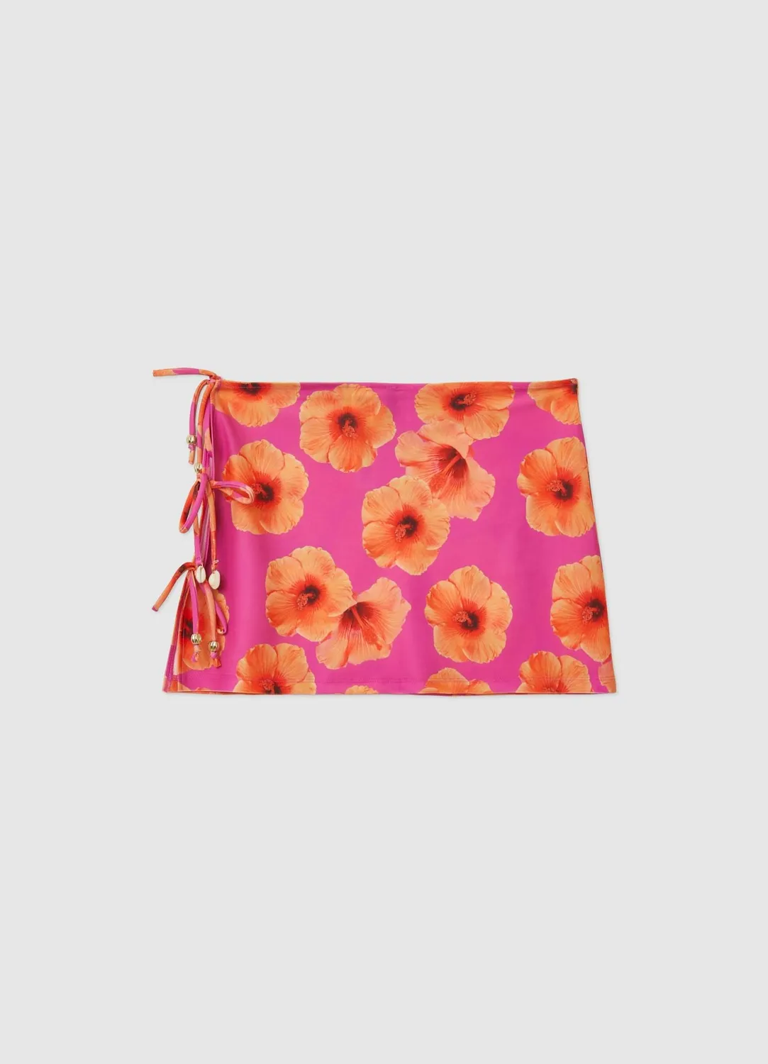 Calliope mini-jupe fleurs nouée plage femme
