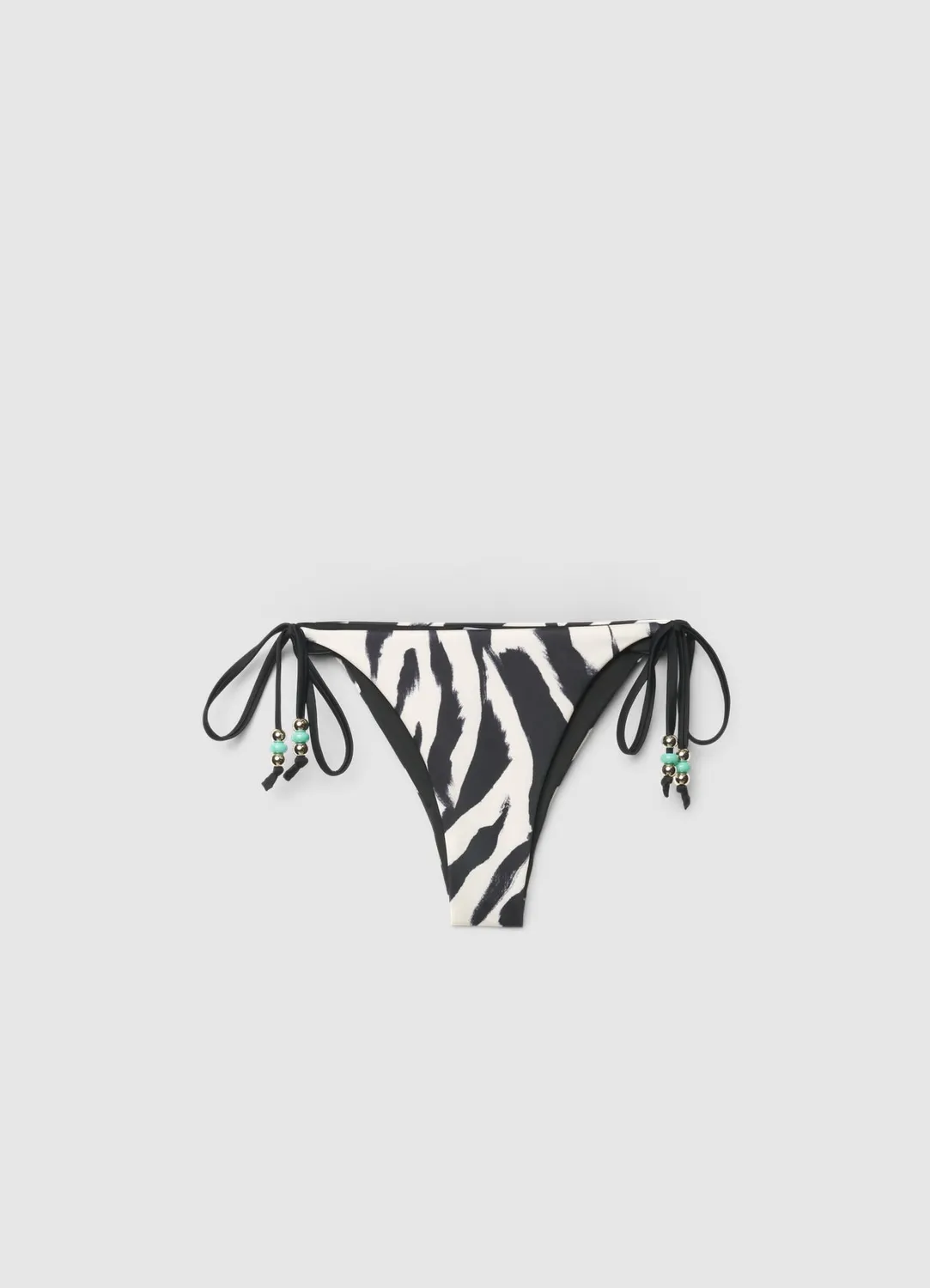Calliope slip bikini zèbre lacets coupe brésilienne