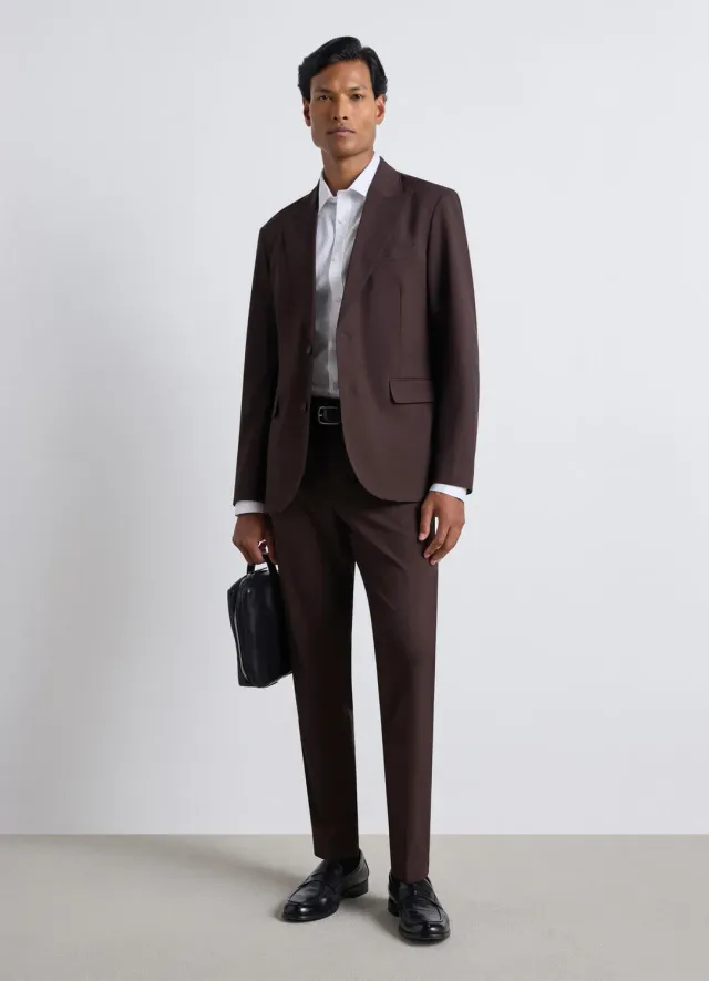Calliope Atelier pantalon tailleur homme pli uni