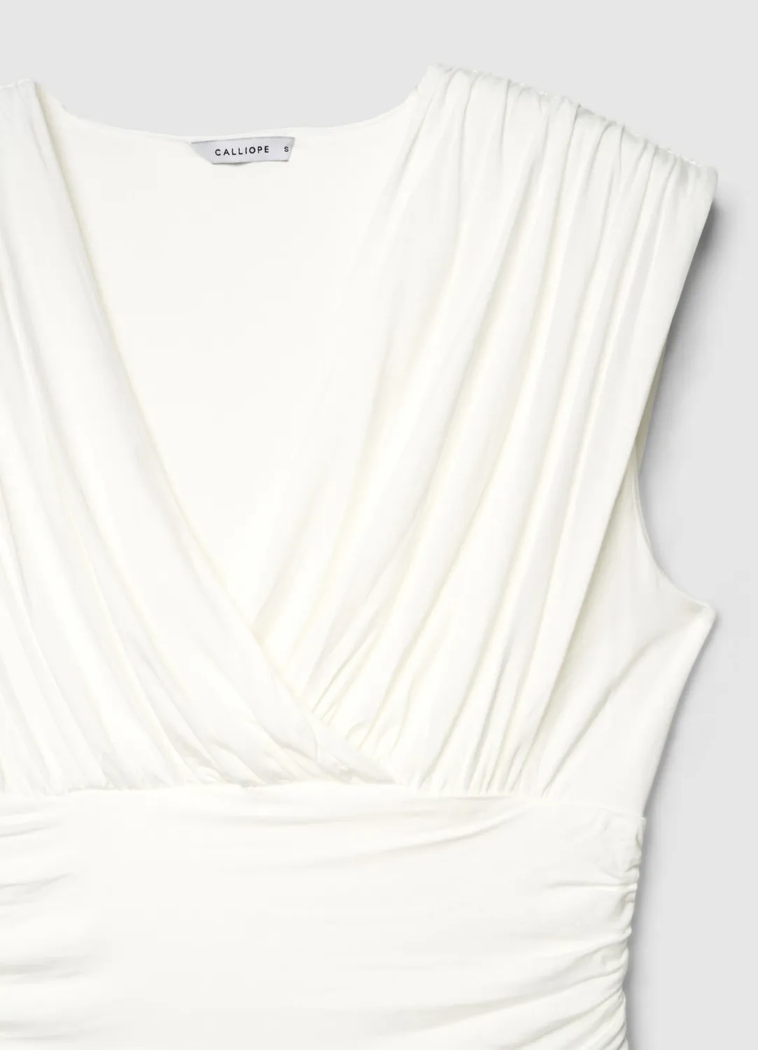 Calliope Top croise drape sans manches femme uni
