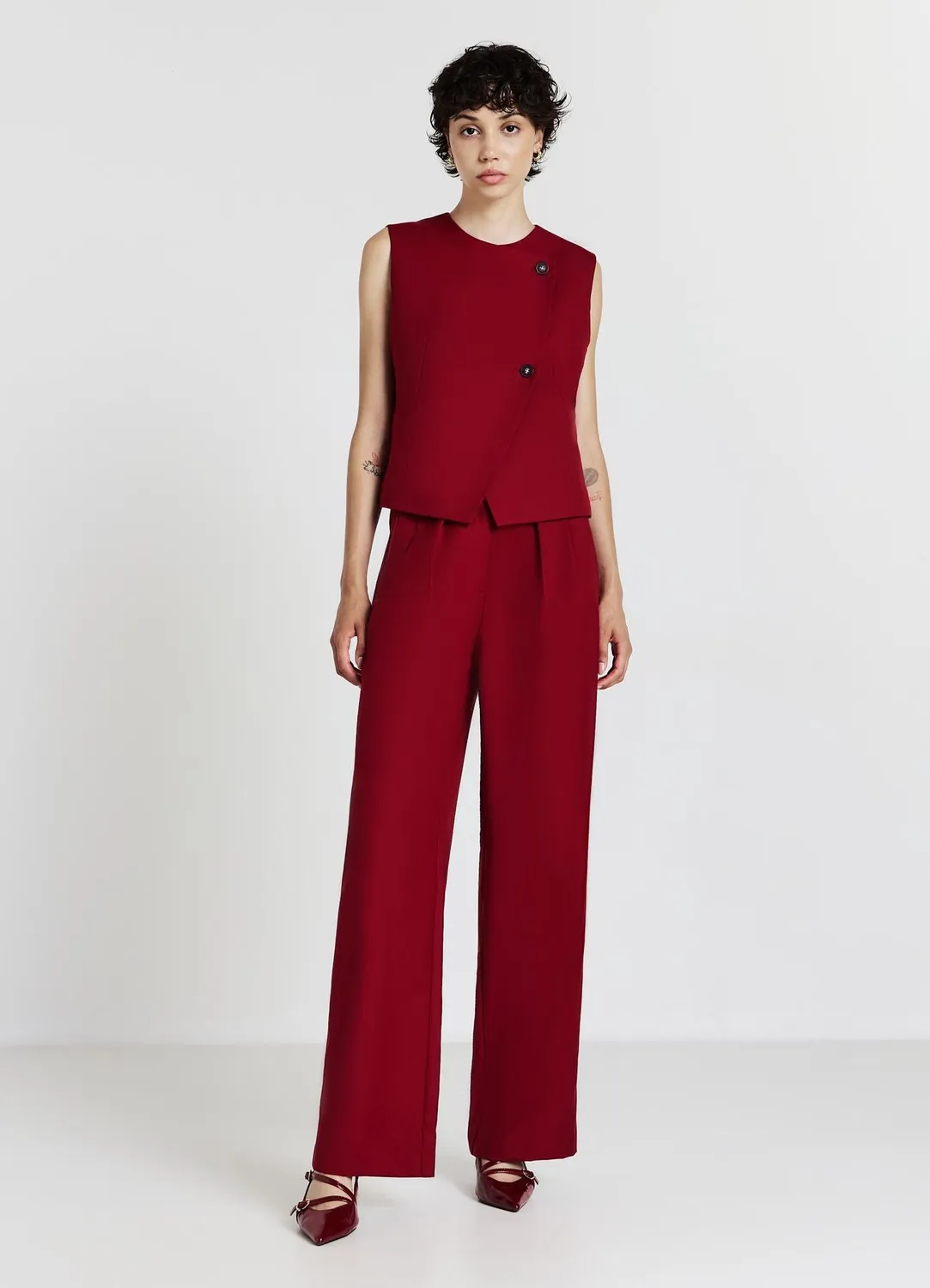 Calliope gilet asymétrique à boutons femme col rond
