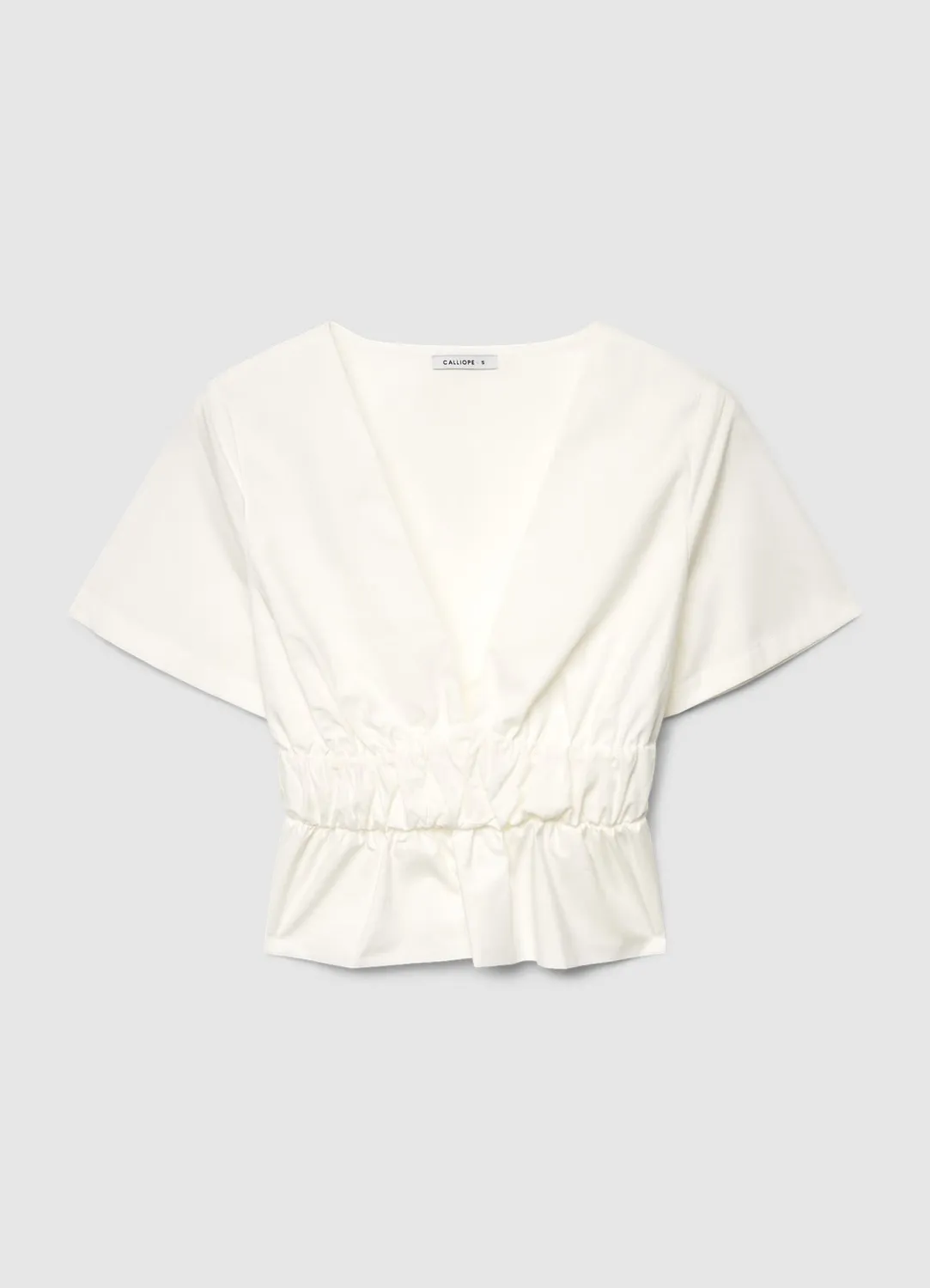 Calliope top peplum col V femme taille resserrée