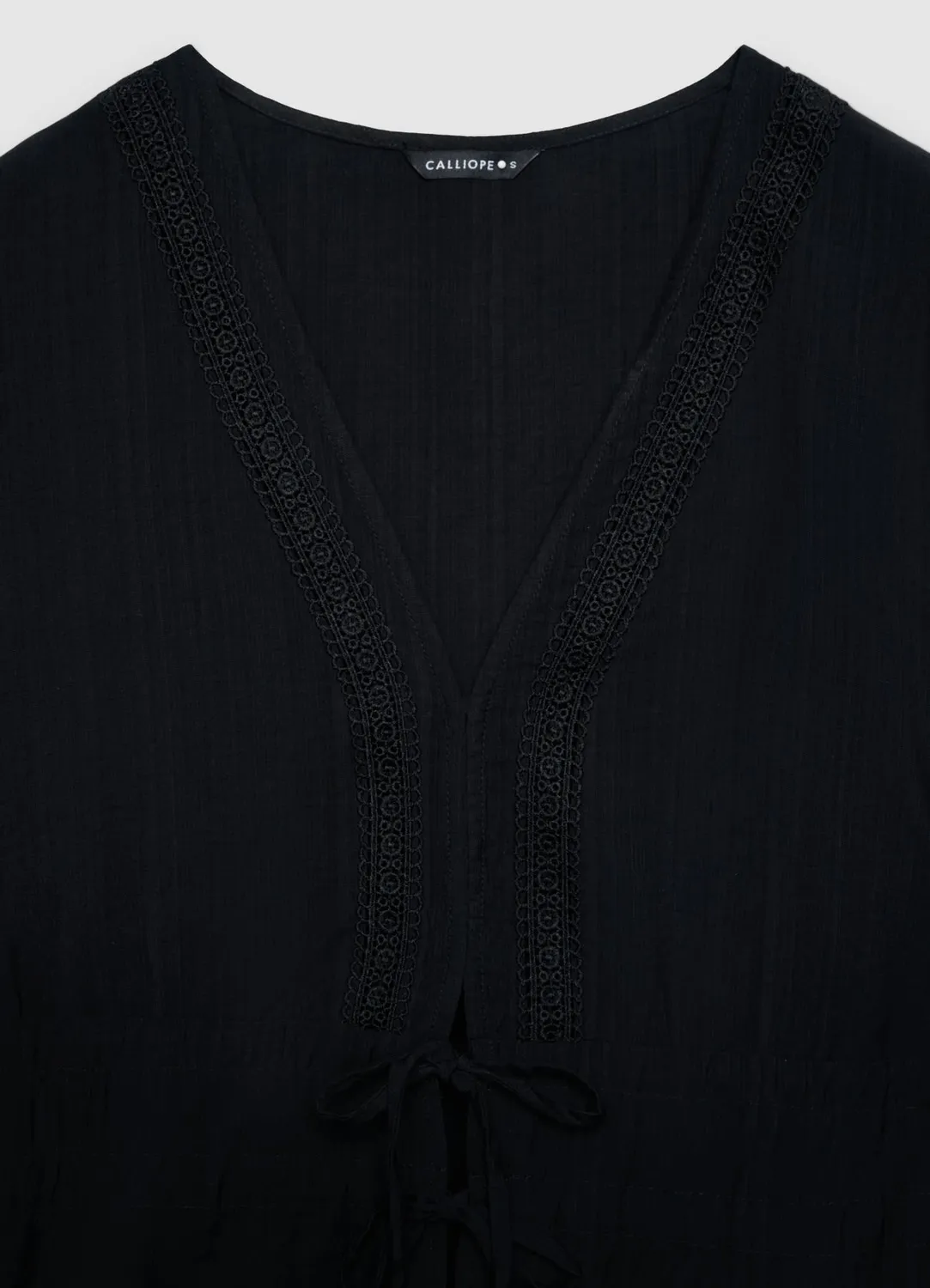 Calliope blouse femme ajourée col V à lacets