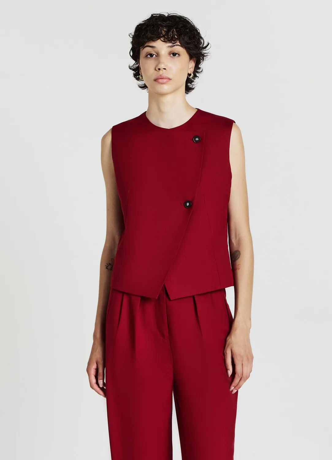 Calliope gilet asymétrique à boutons femme col rond