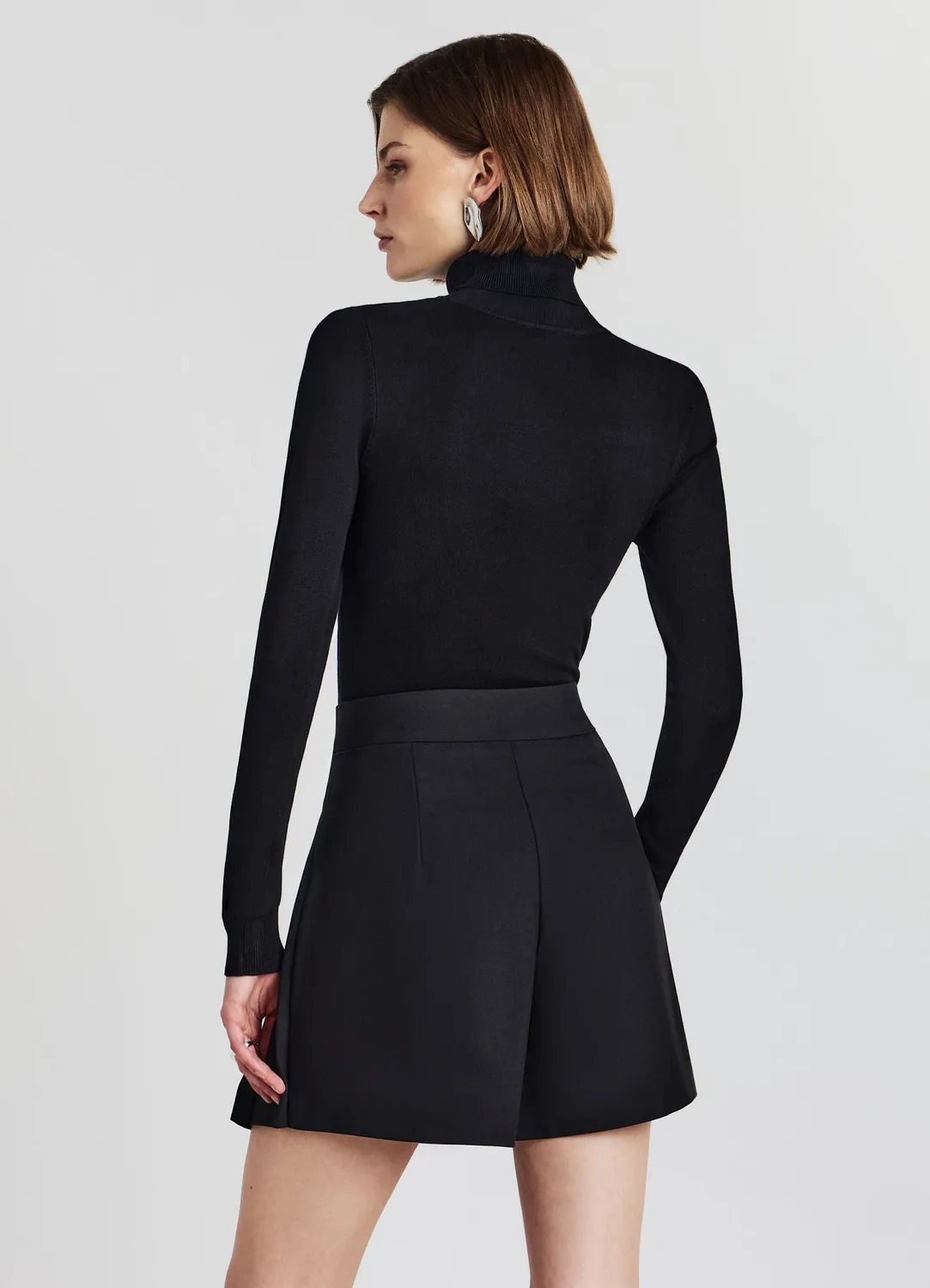 Calliope jupe-short femme plissée portefeuille unie