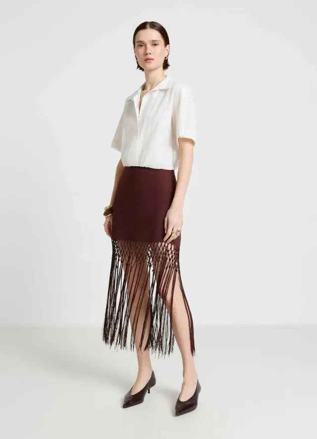 Calliope jupe mini unie à franges taille haute